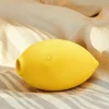 Cute lemon vibrator on the bed