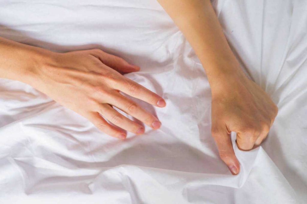 Couple having sex in bed